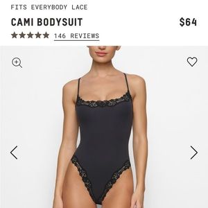 Black lace skims bodysuit